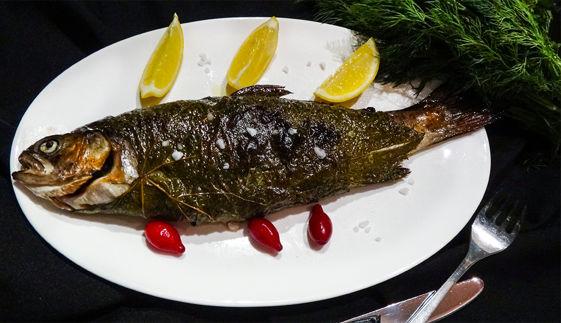 Trout with Cornel in Grape Leaves
